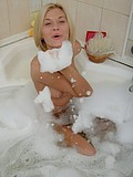 Blonde cutie adores masturbating her horny body in bathtub